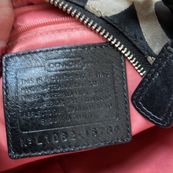 Authentic Coach purse, gentle use.  Inside looks more orange than pink - Picture 8 of 11